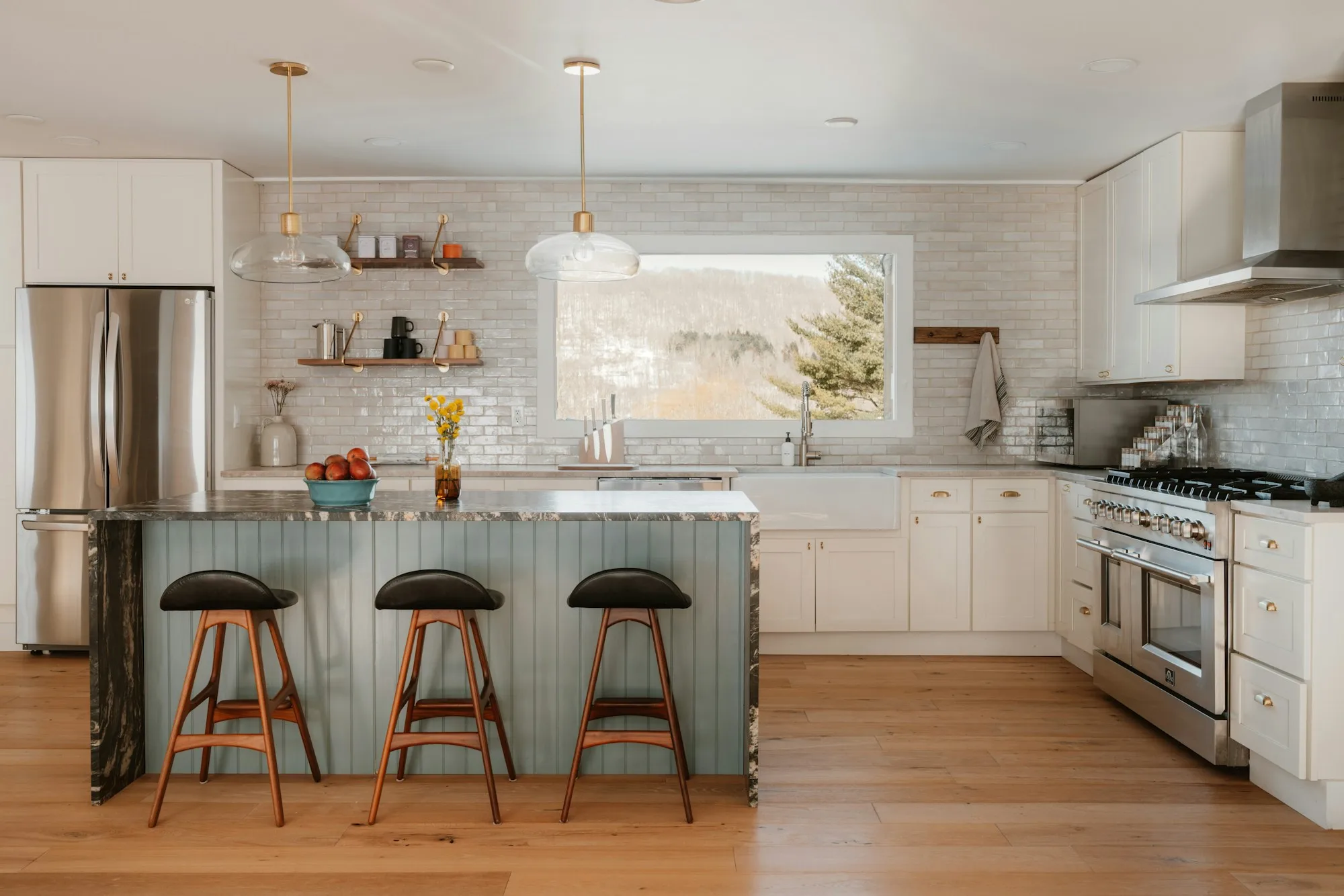 Contemporary kitchen with a central island and stainless steel appliances